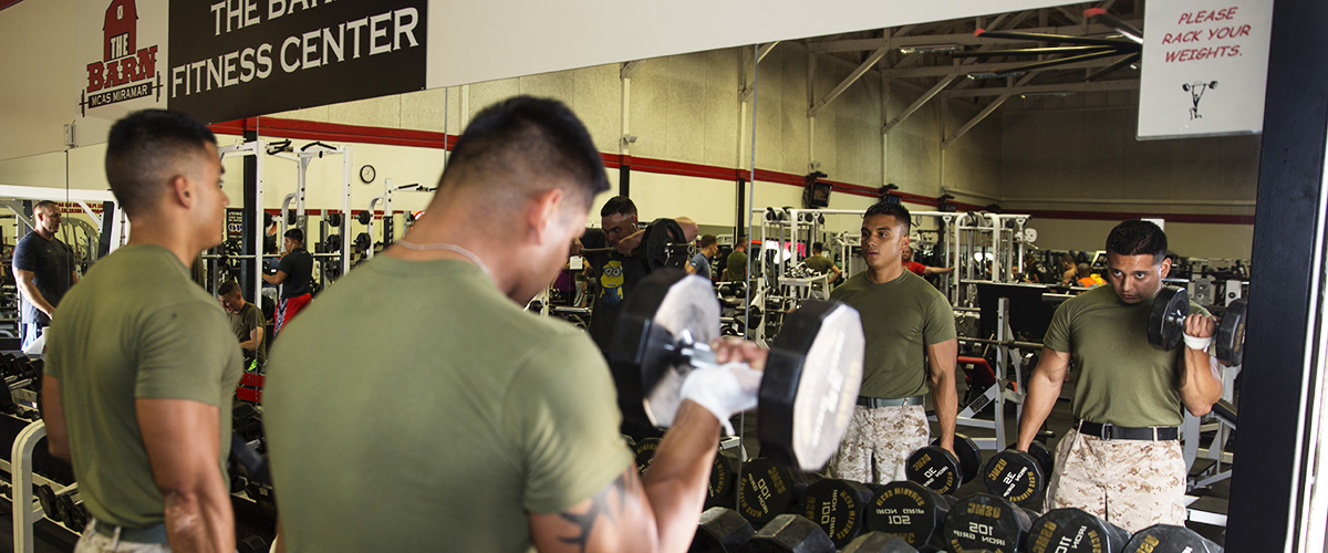 Image of two Marines curing weights at the Barn Fitness Center